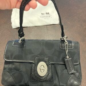 Coach Black Leather Shoulder Bag with Turnlock Closure